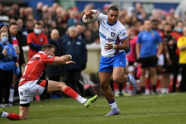 Reece Lyne gets past Ryan Brierley to score Trinity's third try. Picture by Jonathan Gawthorpe.