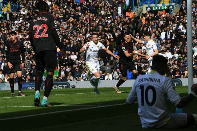 GUIDING THE WAY: Jack Harrison, centre, races off to celebrate after steering home a cross from Raphinha, right, to put Leeds United 1-0 up in Saturday's 1-1 draw against Southampton at Elland Road. Picture by Jonathan Gawthorpe.
