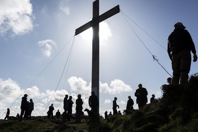 The crisp spring morning made for a stunning image at the cross was put up