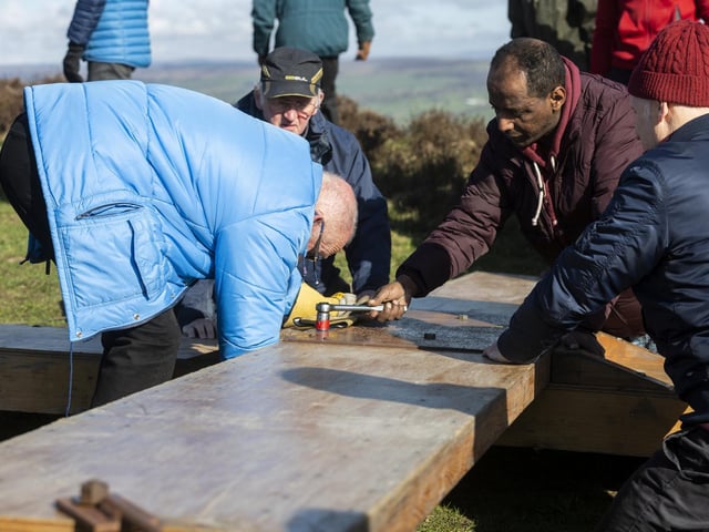 The cross has to be built at the bottom of the hill before it could be carried up