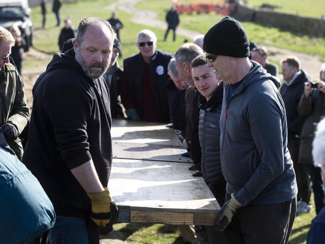 The cross weighs around two tonnes when put together