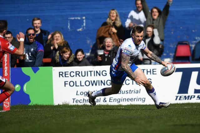 Tom Johnstone scores the first of his two tries. Picture by Jonathan Gawthorpe.