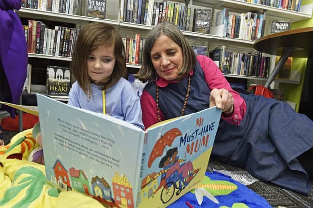 Leeds Lit Fest Children's Festival at Leeds Central Library. Author Maudie Smith with Ada Chelms, four of Horsforth. Photo: Steve Riding