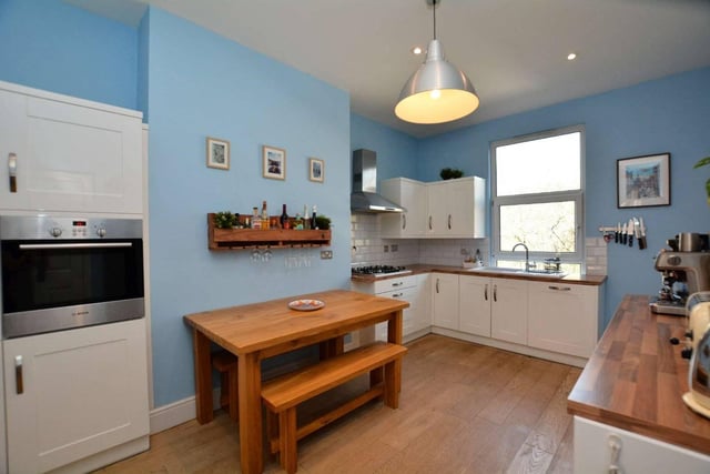 The kitchen is a large space with integrated appliances and plenty of space to relax and prepare a meal. Off this room there is a utility room with W.C.