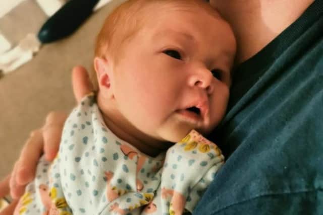 Violet was born on Mother's Day and is now home with Sam and Rachel.