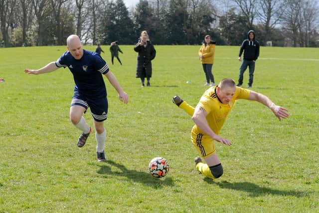 Harehills WMC goalscorer Dan Marcinowski is brought down for a penalty by Alex Macaskill, of West Yorkshire Falcons. Picture: Steve Riding.