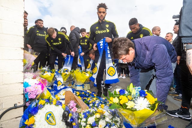 Leeds United players and staff lay floral tributes in memory of Chris and Kevin