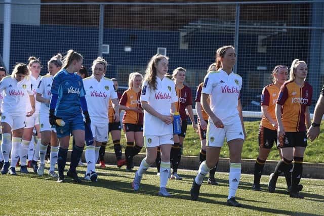 Leeds United skipper Catherine Hamill leads out her team for the Whites' County Cup semi-final against Bradford City. Pic: LUFC.