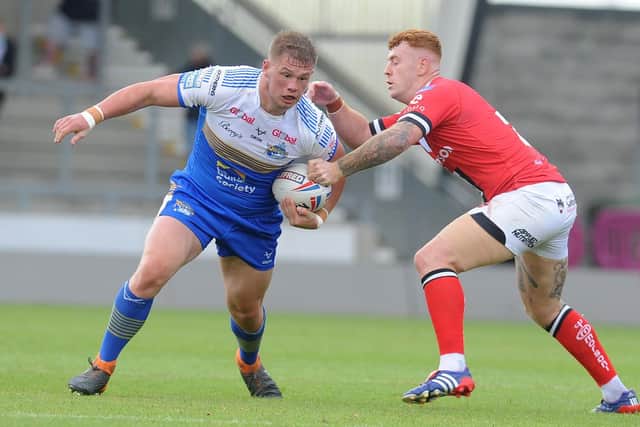 Tom Holroyd on the ball for Rhinos last season. Picture by Steve Riding.