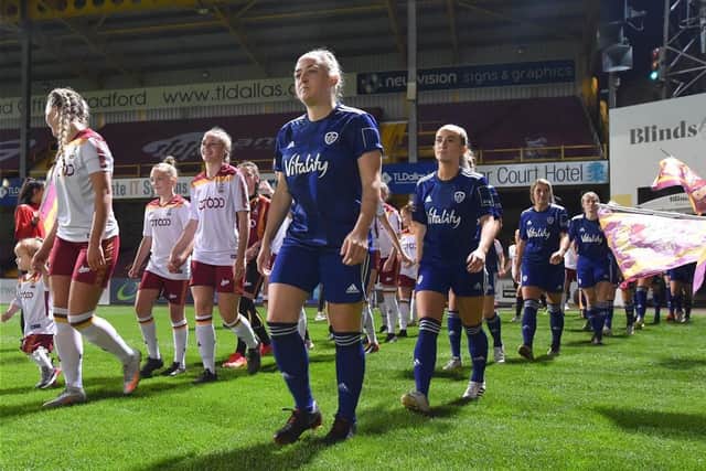Leeds United Women and Bradford City head out onto the pitch at Valley Parade for a Division One North fixture. Pic: LUFC.