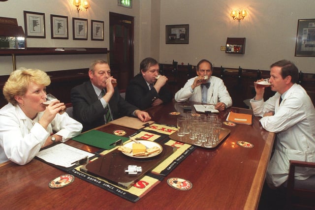 Pictured (left to right) is Dawn Bennett, (microbiology) Colin Cockerham, (sales administrator) Mike Frost, Dudley Mitchell, (brewing support manager and head of testing panel) and Bob Dineen (quality assurance manager) testing beer at Tetley's Brewery in 1998.