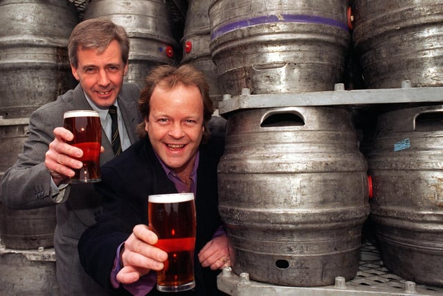 Dr Peter Brookes, Brewery Director at Tetley's with radio presenter Bruno Brookes holding the relaunched Tetley's Bitter at Tetley's Brewery in 1998.
