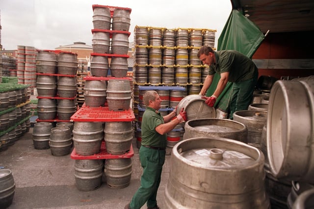 Draymen loading up the barrels of Carlsberg at Tetley's Brewery in November 1999.