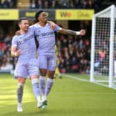 JOB DONE: Jack Harrison, centre, celebrates after putting Leeds United 3-0 up at Watford alongside substitutes Crysencio Summerville, right, and Sam Greenwood, left. Photo by Alex Morton/Getty Images.