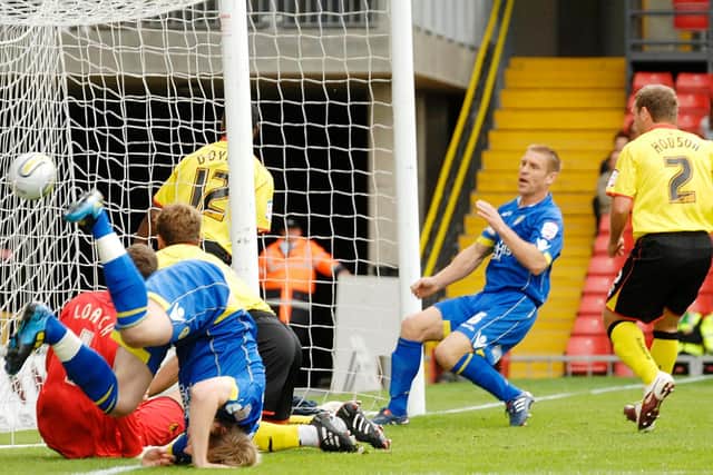 CARNAGE: A header back across goal from Luciano Becchio, left, caused mayhem in the Watford box and paved the way for captain Richard Naylor, right, to bag an early Leeds United winner at Watford back in August 2010. Picture by Bruce Rollinson.