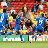 LANDMARK STRIKE: Leeds United captain Richard Naylor, centre, celebrates netting the only goal of the game on his 450th career appearance to give Simon Grayson's Whites a 1-0 triumph at Watford back in August 2010. Picture by Bruce Rollinson.