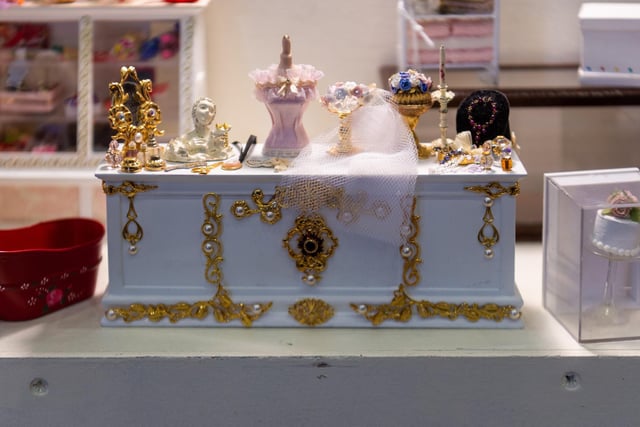 Examples of miniatures on display for members of the public to purchase.