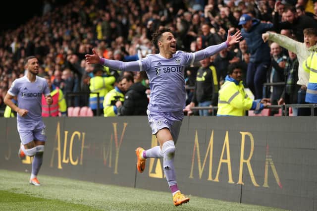 CUE THE LIMBS: Record signing Rodrigo races off to celebrate in front of the travelling Whites fans, his strike sparking huge celebrations in the Vicarage Road away end. Photo by BEN STANSALL/AFP via Getty Images.
