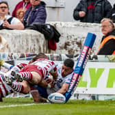 Lewis Murphy scores Trinity's try. Picture by Tony Johnson.
