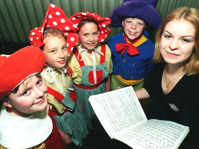 Teenager Kelly Gomersall, right, was choreographing a production of Wizard Of Oz, in rehearsals at Queensway Primary. She is pictured with some of the Munchkins, from left, Jack Aynsley, Lauren Gresty, Rachel Greenwood and Jonathan Barrett.