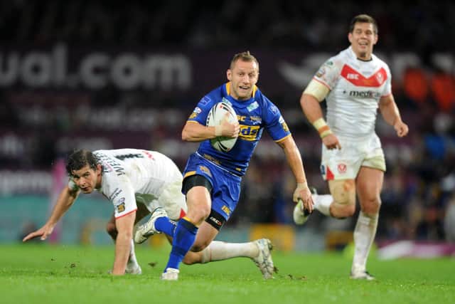 Rob Burrow, pictured scoring against St Helens in the 2011 Super League Grand Final, was diagnosed with motor neurone disease in 2019. Picture by Steve Riding.
