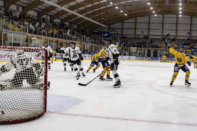 Cole Shudra, partly hidden, celebrates his second goal for Leeds Knights against Milton Keynes Lightning on Sunday night Picture courtesy of Oliver Portamento.
