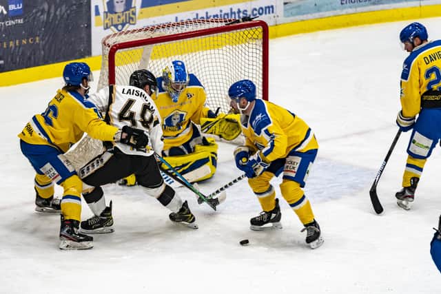Ben Solder, left and Sam Zajac, second right, battle with Milton Keynes's Adam Laishram in front of the Leeds net. Picture courtesy of Oliver Portamento.