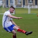 West Yorkshire Division 1 title-chasing Pool's Ryan Firth scores from a freekick in the 11-1 home win over East End Park. Picture: Steve Riding.