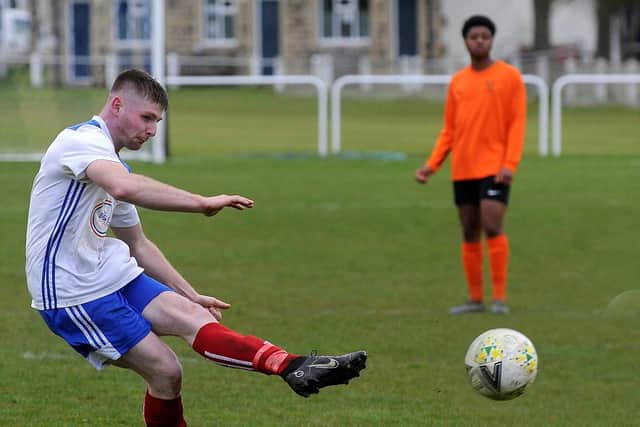 West Yorkshire Division 1 title-chasing Pool's Ryan Firth scores from a freekick in the 11-1 home win over East End Park. Picture: Steve Riding.