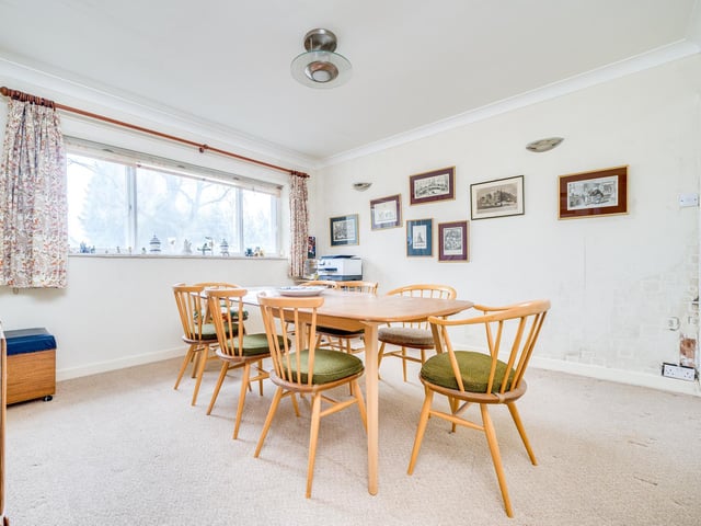 The current dining room is a large space ideal for relaxing.