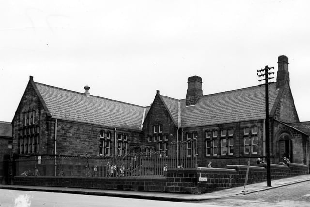 Town Street runs across the foreground of this view with the junction with Club Lane seen on the right in March 1965. This photo shows one of the buildings which made up Rodley County Primary School. Because teachers were often in short supply, older children sometimes taught the younger ones.