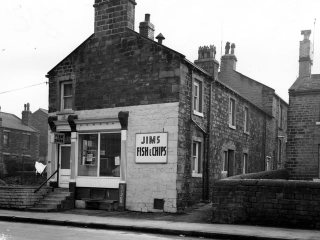 Jim's fish & chip shop on Town Street pictured in March 1965. This property also had an entrance facing onto Kirkham Street. A sign in the window states 'Wet Fish Sold Here, Haddock'. Outside the shop is a wooden bench next to a Tizer advertisement.