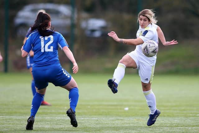 LATE LEVELLER: Kathryn Smith, top, equalised for Leeds United Women with the last kick of last week’s County Cup final with Brighouse Town which the Whites eventually lost on penalties.