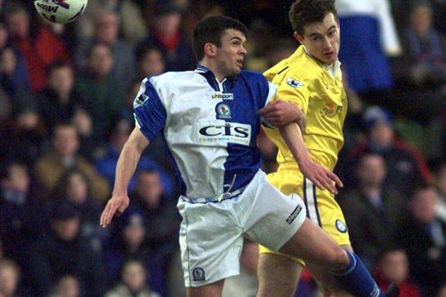 David Wetherall gets the better of Blackburn's Jeff Kenna during the Premier League clash at Ewood Park in January 1999. The Whites lost 1-0.