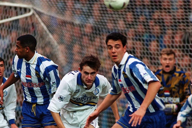All eyes on the prize for David Wetherall during Leeds United's clash with Sheffield Wednesday in March 1995.
