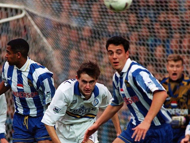 All eyes on the prize for David Wetherall during Leeds United's clash with Sheffield Wednesday in March 1995.