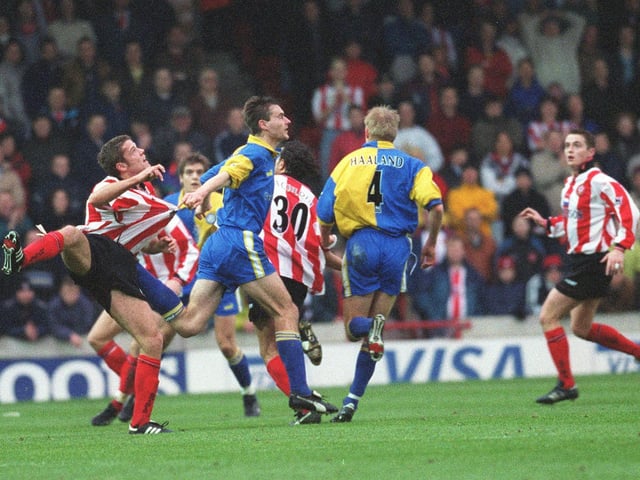 Spotted the shirt tug? David Wetherall in action against Southampton at The Dellin February 1999.