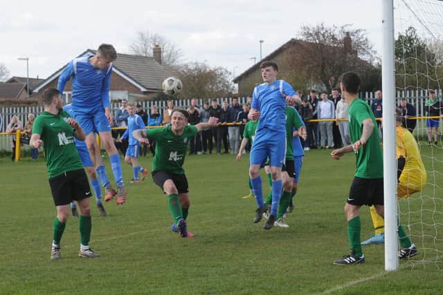 Jack Keane heads Whitkirk Wanderers Blues into the lead and on course to become champions. Picture: Steve Riding.