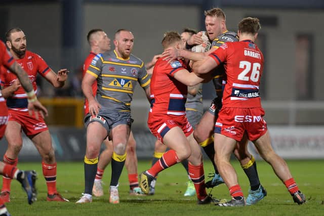 Castleford Tigers' Joe Westerman is stopped by the 
Hull KR defence. Picture: Bruce Rollinson.