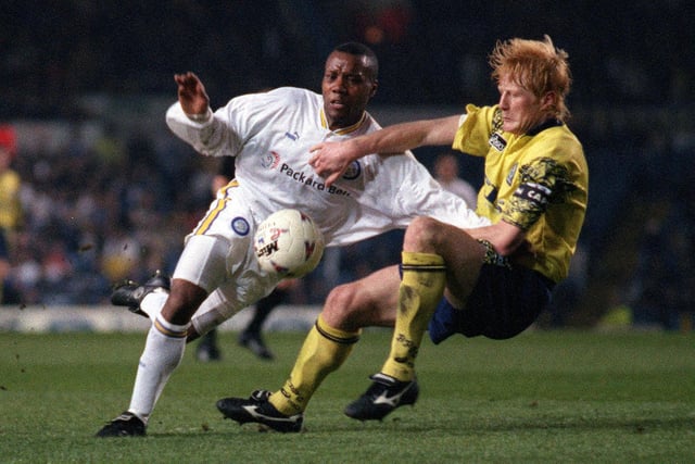 Rod Wallace and Blackburn Rovers captain Colin Hendry battle for the ball.