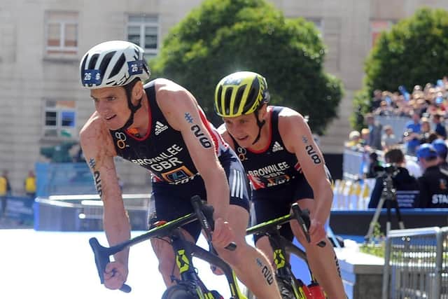 Jonny Brownlee leads his brother Alistair on the bike in the Elite Mens Race through Millennium Square in 2017 (Picture: Tony Johnson)