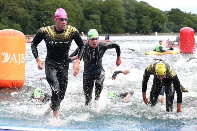 Alistair Brownlee (centre) exits the water in the Elite Men's race during the 2019 ITU World Triathlon Series Event in Leeds. (Picture: Martin Rickett/PA Wire)