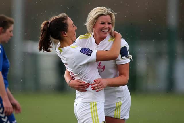 Leeds United Women strikes Laura Bartup celebrates with skipper Catherine Hamill. Pic: LUFC.