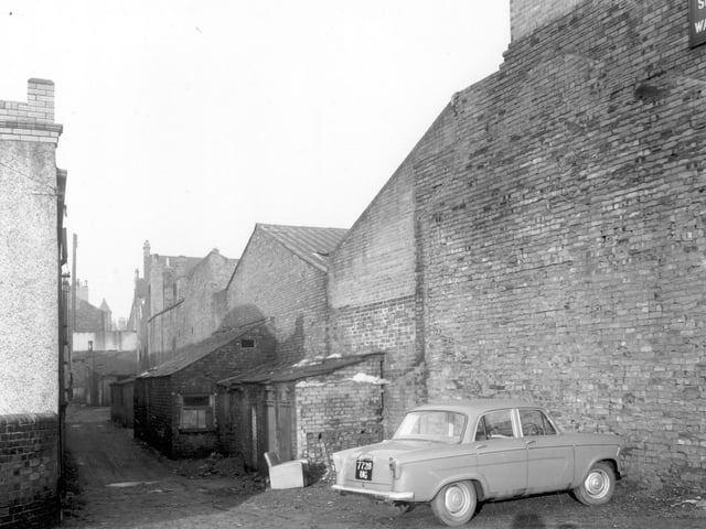 Looking down Maltkiln Yard in January 1961. The factory premises of Taylor Bros. and Miller Ltd can be seen towards the right. View from Manor Street.