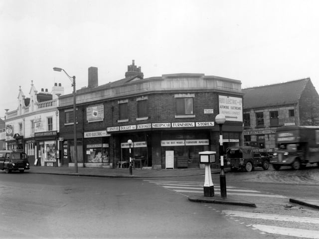 Sheepscar Street South seen from the junction with North Street in January 1961. Pictured, from left, is the Pointer Inn, Sheepscar Chocolate Box, and Dr. Louis Roberts' surgery. Auto Electric (Leeds) Ltd can also be seen on the right edge on Holroyd Street. Also pictured is Sheepscar Furnishing Stores.