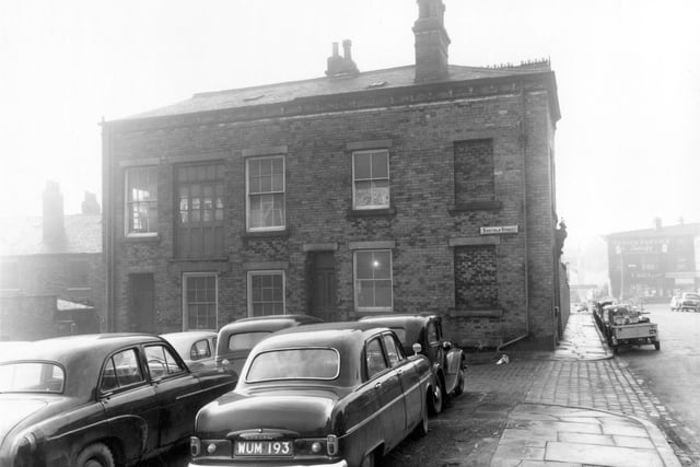 Cars parked in the foreground of this view stand where the odd numbered side of Renfield Street was before slum clearance. Pictured in January 1961.