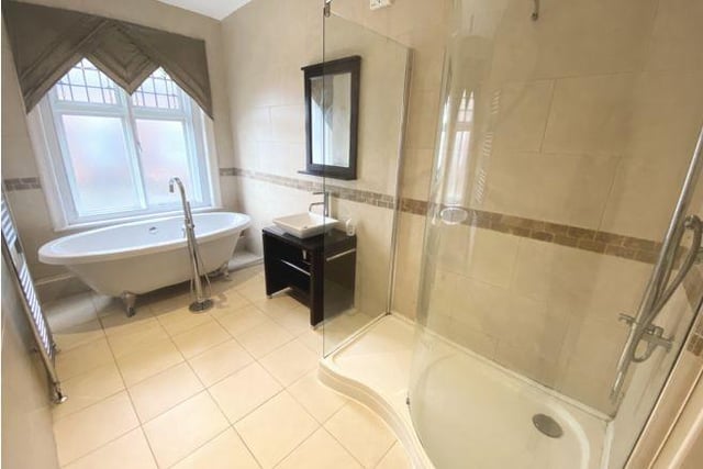 The large family bathroom comprises of a three piece suite; free standing bath and walk in shower cubicle.
