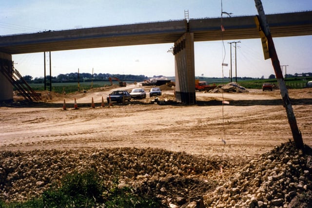 The M1 motorway expansion under construction showing the newly built bridge to carry Barwick Road at Garforth across the motorway.