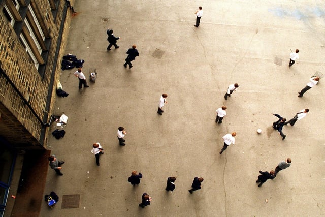 A lunchtime game of football in the playground for some of the pupils at Leeds Grammar School in May 1997.
