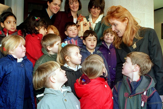 The Duchess of York chats with pupils from Richmond Hill Primary outside The Queens Hotel during a visit to the city in December 1997.